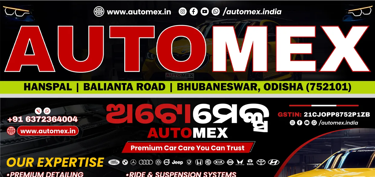 Automex shop signage in red, black and yellow