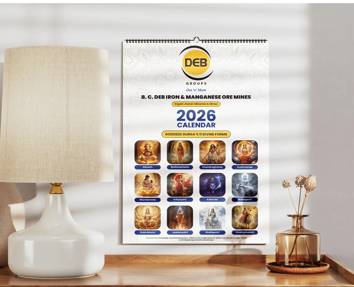 DEB Groups 2026 wall calendar in a styled interior